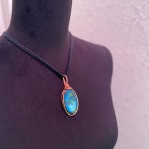 🫐 SOLD 🫐 Copper wire wrapped Labradorite crystal strung on a black deer lace.